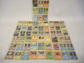 Seven double sided sheets housing a collection of mainly ' Holo ' Pokémon cards including Fossil,