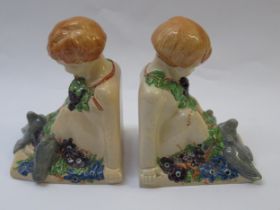 Pair of Ashtead pottery Harvest Putti with pidgeons bookends Some crazing, otherwise in good