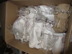 Box containing a quantity of various glassware, mainly drinking glasses