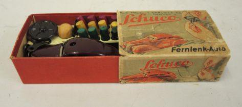Schuco tin plate clockwork model car with spare keys, in original box