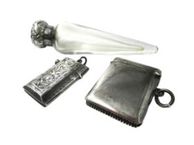 Silver mounted tear drop shaped glass perfume bottle, together with two silver vesta cases