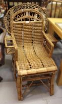 Rattan steamer chair, the back worked ' Madeira 1974 from M.V. Blenheim' A little dusty but