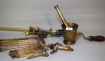 Brass pestle and mortar, miscellaneous brass door furniture and sundries including a window winder