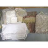 Quantity of miscellaneous textiles to include a printed Paisley shawl, two white raised work