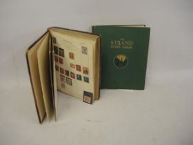 Strand stamp album containing World stamps, including Penny Black, Penny Reds and Blues, together