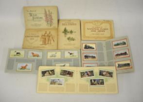 Quantity of John Player and Wills cigarette card albums