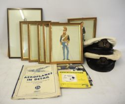 Two Royal Navy officers caps, together with a quantity of aircraft recognition books and military