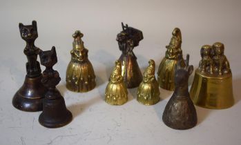 Group of four brass Punch bells, together with five other brass and bronze animal form bells