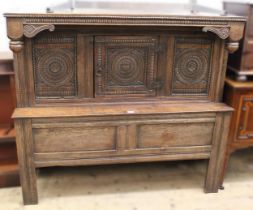 18th Century and later oak side cabinet, with carved panels