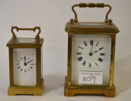 Small gilt brass carriage clock with enamel dial and Roman numerals, together with another French