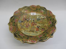Imari style pottery comport decorated with figures, 30cm diameter