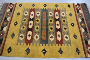 Flatweave rug of Kurdish design, 182 x 122cm together with a small Kelim cushion