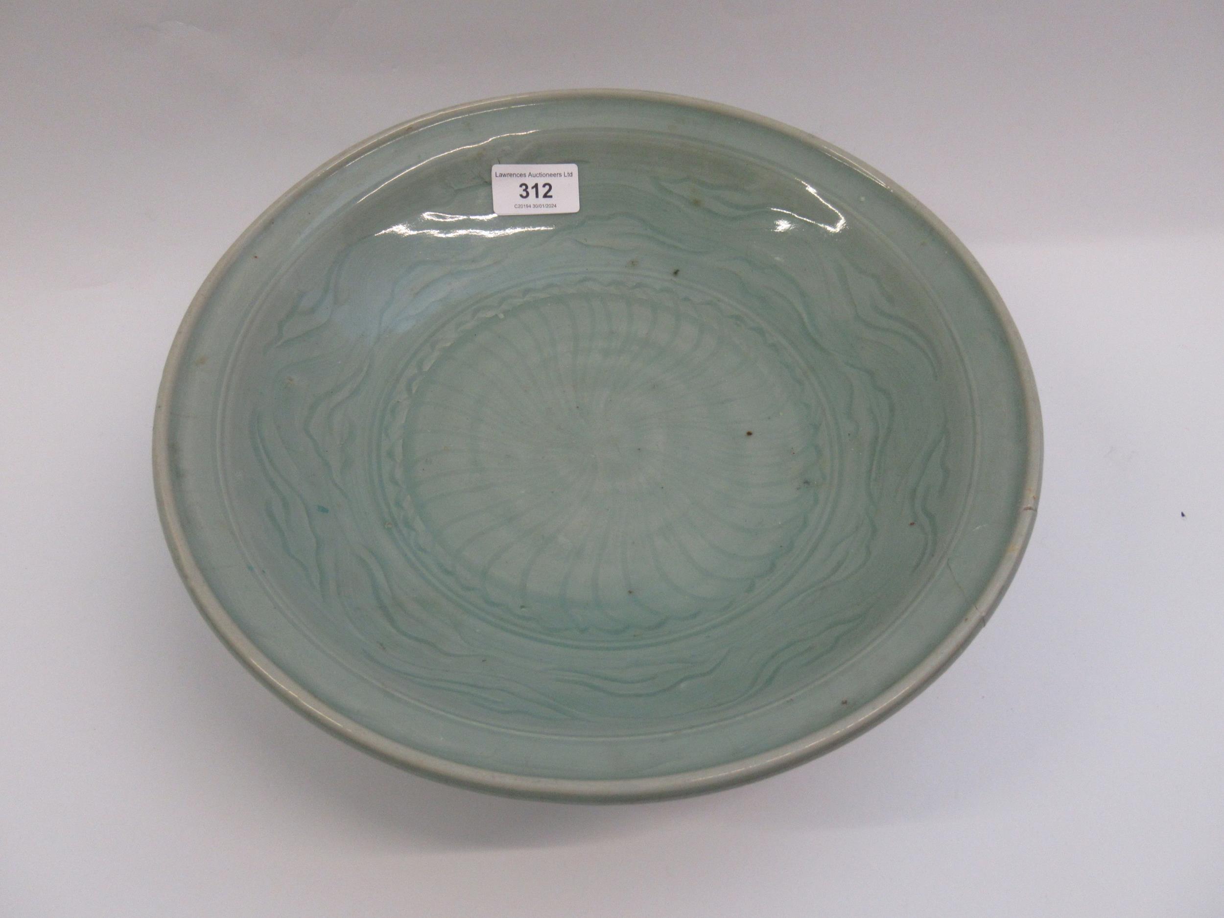 Chinese Celadon circular deep dish with shallow incised decoration, 32cm diameter, with a hardwood