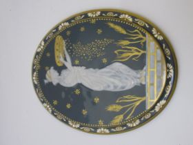 Minton type pate-sur-pate oval plaque decorated with a scene depicting a classically robed female