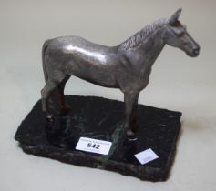 Modern Birmingham silver model of a horse on a green serpentine marble base, 20 x 18cm overall