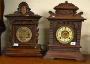 Two American two train mantel clocks, an oak cased dome shaped two train mantel clock and a small