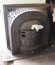 Jan Jaarsma, late 19th Century cast iron stove with relief moulded cast decoration, including base -