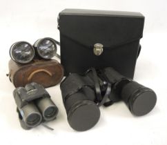 Pair of Prinz 10 x 50 binoculars cased, together with two other pairs of binoculars