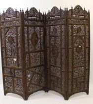 Late 19th / early 20th Century Indian carved hardwood four panel screen, 193 x 240cm maximum