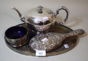 Silver backed hand mirror, plated teapot, coaster and small oval tray