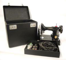 Singer Featherweight sewing machine in original fitted case