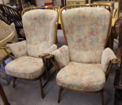 Near pair of mid 20th Century Ercol stickback armchairs