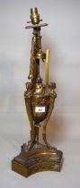 Late 19th / early 20th Century ormolu lamp base in the form of three Bacchus busts surrounding a