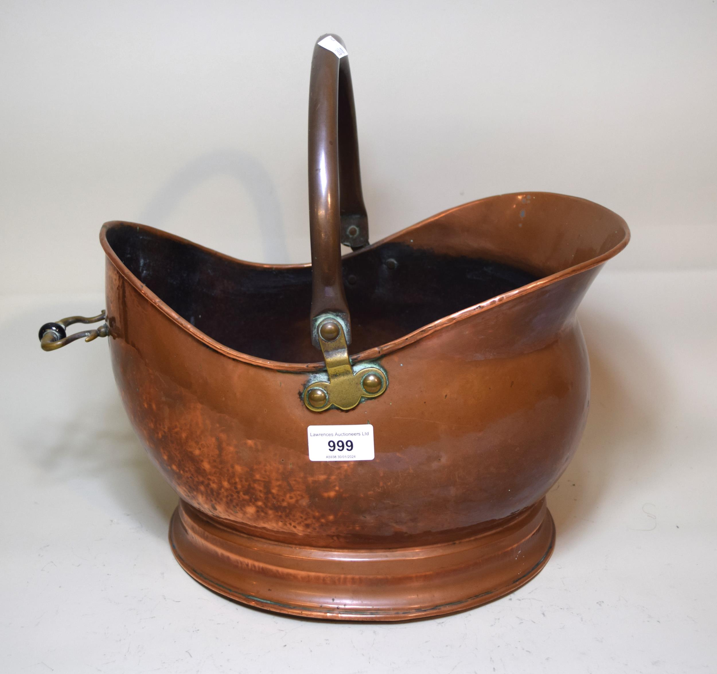 19th Century copper helmet shaped coal scuttle with swing handle