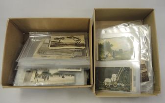 Two boxes containing a large collection of miscellaneous postcards