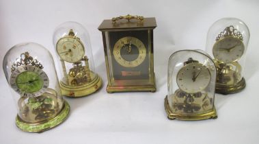 Group of ten brass anniversary clocks, including Schatz, Kundo and Hermie, together with two brass