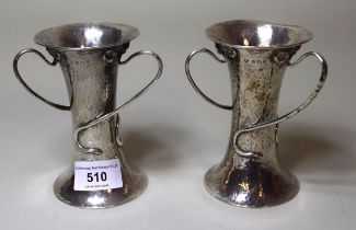 Pair of Art Nouveau beaten silver three handled vases, Birmingham 1908, 8.5oz t No splits. Dents