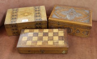 Three wooden boxes, including chess board box