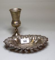 Small oval embossed silver trinket dish and a small 19th Century Russian silver goblet, 4.5oz t
