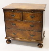 Good quality reproduction walnut and burr wood chest in early 18th Century style, the moulded top