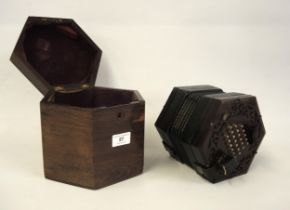 G. Jones twenty four button concertina with rosewood ends and original fitted box (at fault)