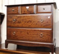 Mahogany bedroom chest by Stag, 82cm wide together with a pair of matching bedside chests, 53cm wide