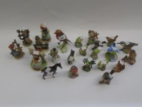 Collection of twenty three various Royal Worcester, Goebel and Beswick figures of birds etc,