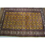 Pakistan carpet of Turkoman design with gold ground, 258 x 168cm