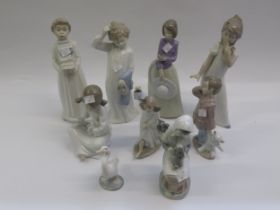 Group of eight Nao figurines and one Lladro figure of geese