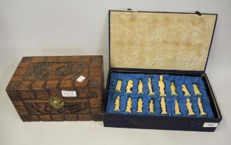 Mid 20th Century Chinese carved bone chess set together with a small Chinese carved camphor wood box