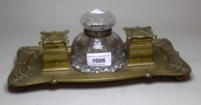 Art Nouveau brass two bottled inkstand with glass well, 28cm wide