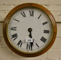 Circular oak cased wall clock, the enamel dial with Roman numerals and single train movement, 9.