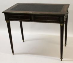 Good quality Continental mahogany and brass mounted writing table, the leather inset top above two