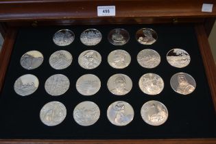 Modern mahogany cased set of silver medallions, ' One Hundred Greatest Masterpieces ' with