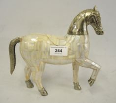 Unusual mother of pearl shell and silver plate mounted figure of a horse 21cm high x 22cm wide