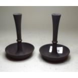 Pair of Jens Quistgaard (Danish) iron and brass candle holders