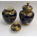 Pair of Royal Crown Derby oviform vases with covers, each with gilt floral decoration on a cobalt