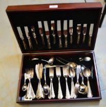Modern mahogany cased eight place setting canteen of silver plated cutlery by Butler