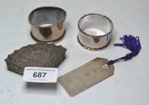 Continental silver (925 mark) fan shaped pill box, together with a silver napkin ring, a plated
