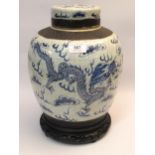 Large 19th Century Chinese blue and white crackleware ginger jar painted with dragon and clouds on a